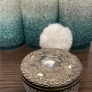 Vintage glass mirror and silver vanity jar with puff